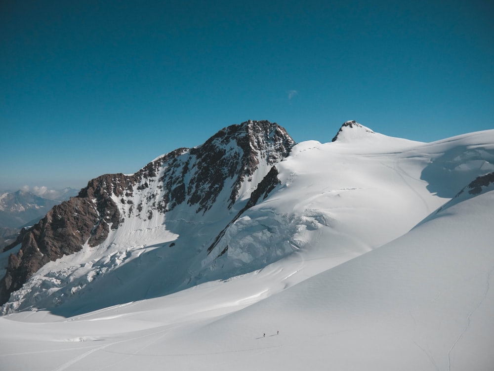 brown mountain covered by snow