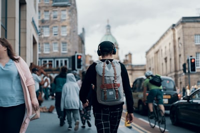 peoples walking on street busy google meet background