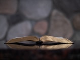 open book on glass table