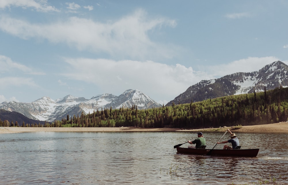 two men rowing a boat