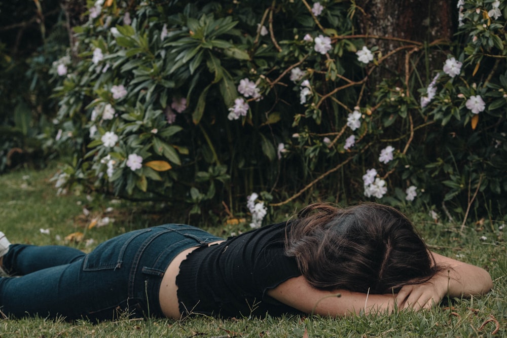 woman planking on the grass