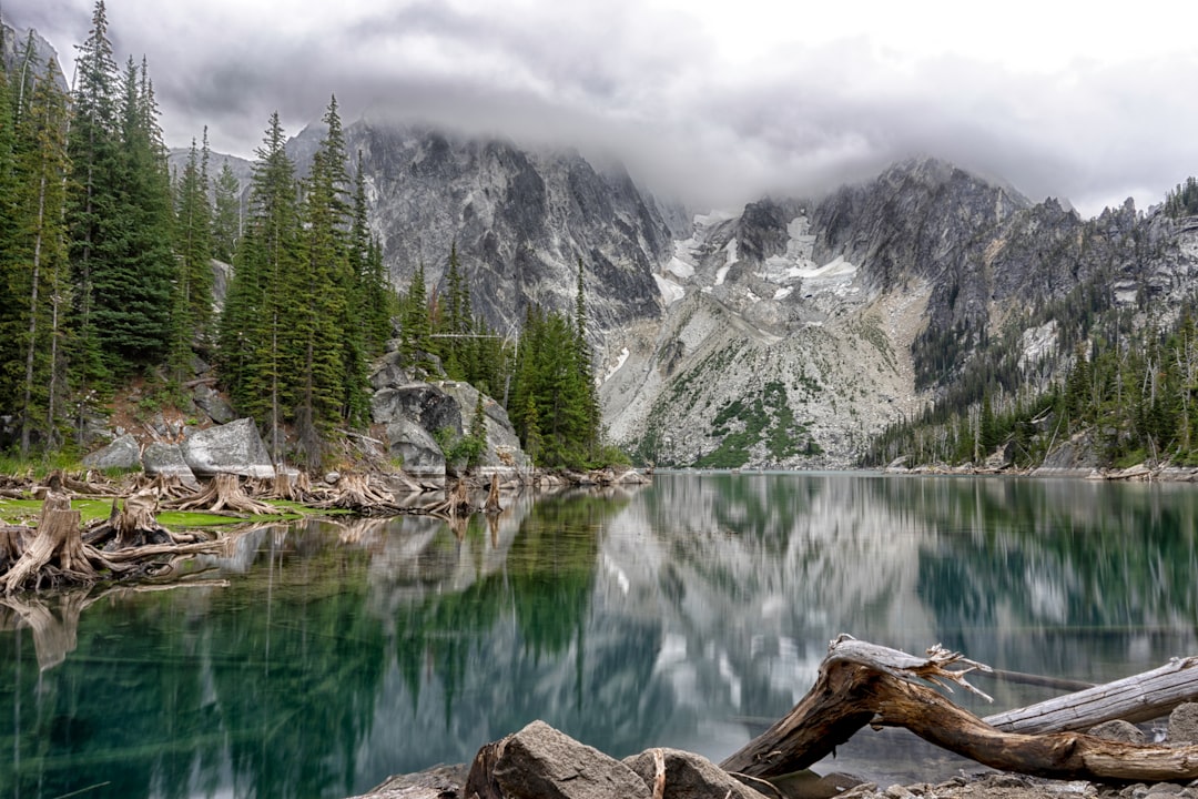 gray mountains near body of water