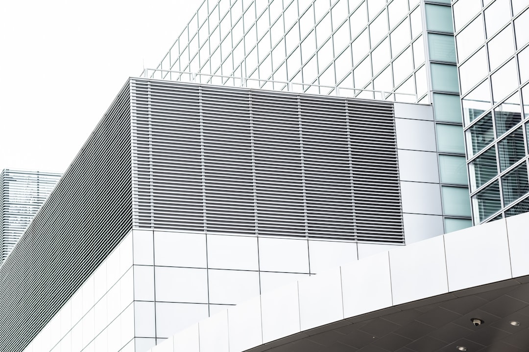 clear glass building under white sky