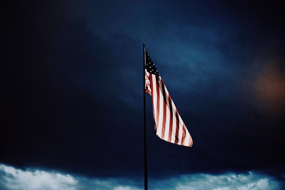 USA flag under dark sky