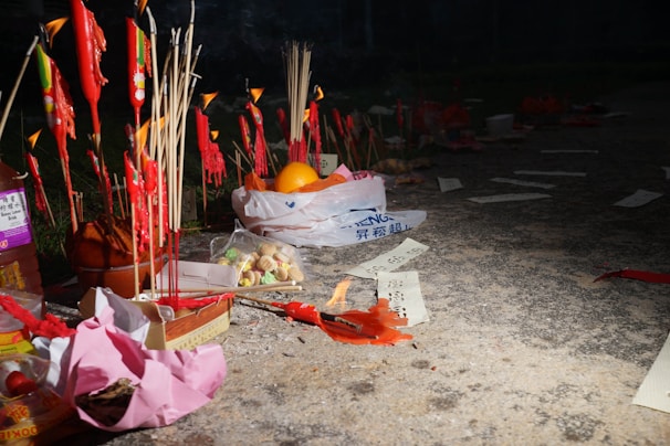 Close-up of premium hawan samagri packs with samidha wood sticks and guggul ready for ritual use.