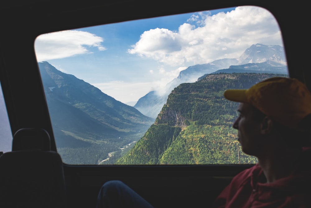 man sitting on chair inside vehicle