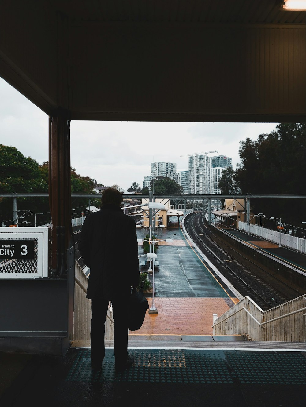 person standing in front of staircase