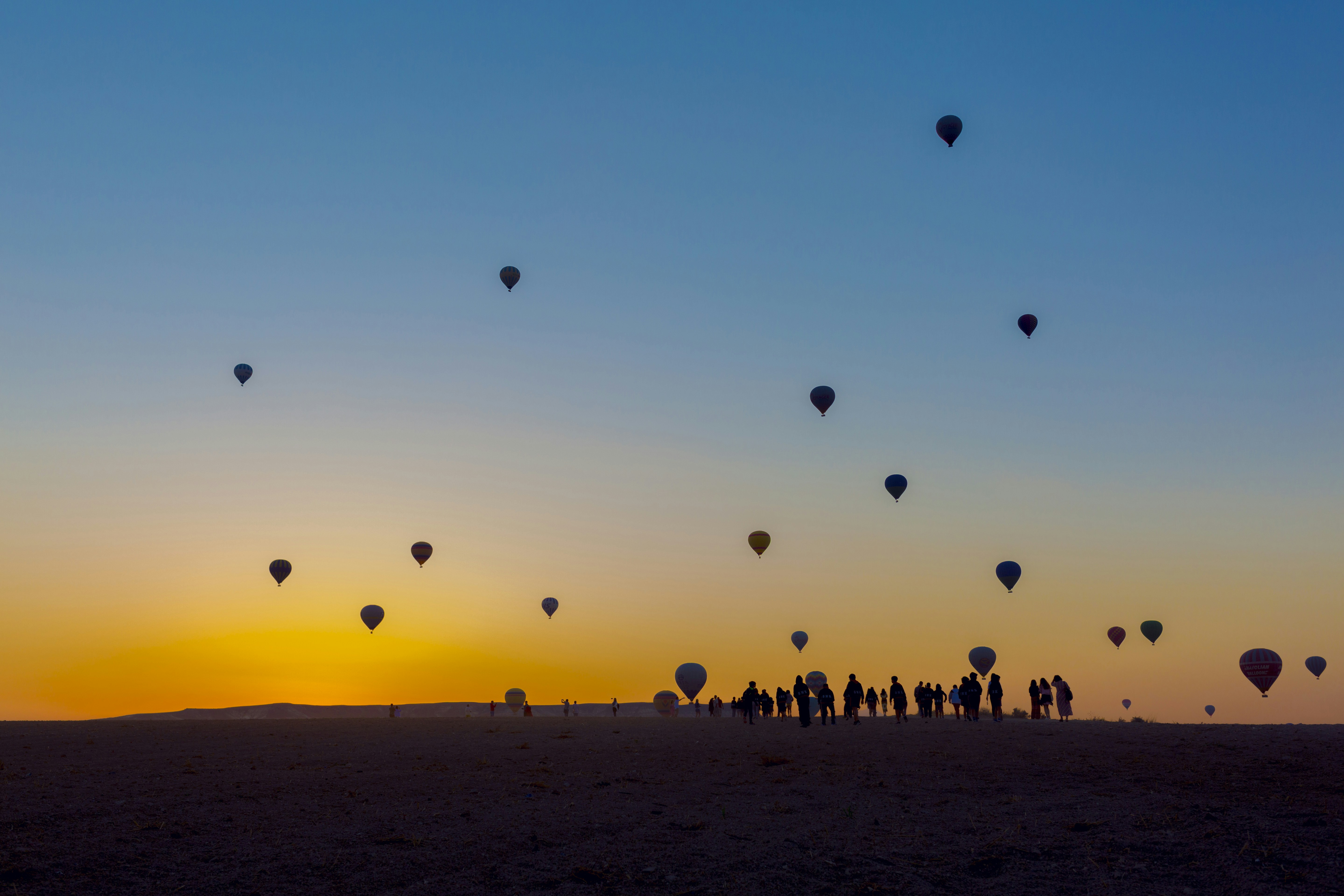 silhouette of hot air balloons amazing teams background
