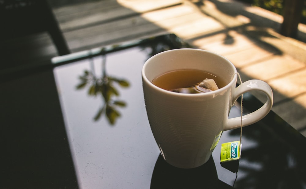 cup of tea on black panel