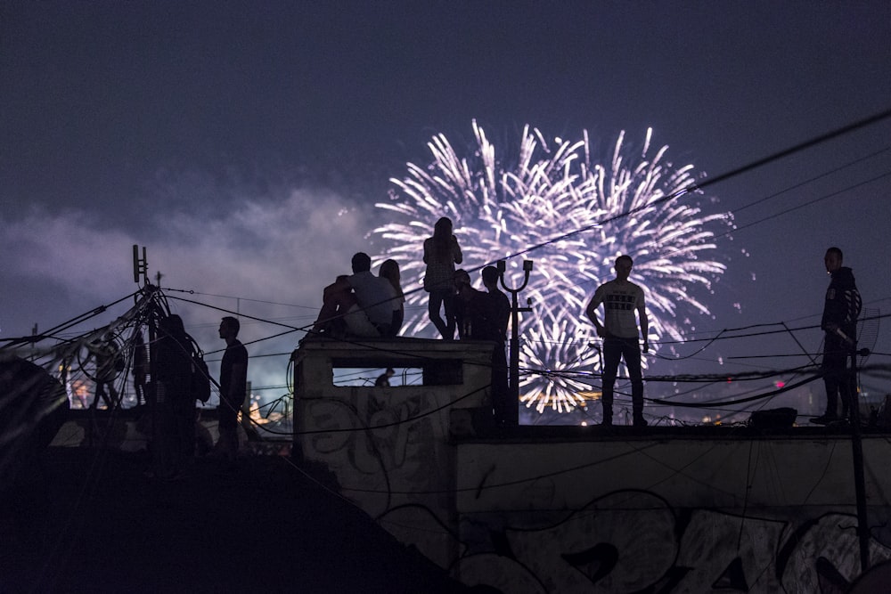 person watching fireworks display