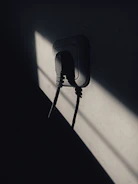 Various electrical sockets and plugs displayed on a clean white background