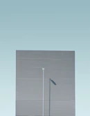 A minimalist urban scene with clean lines and soft tones.