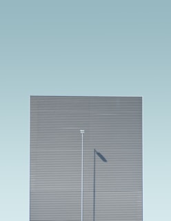 A minimalist urban scene with clean lines and muted colors.