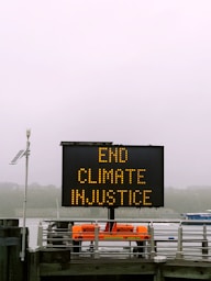 End Climate Injustice on LED screen