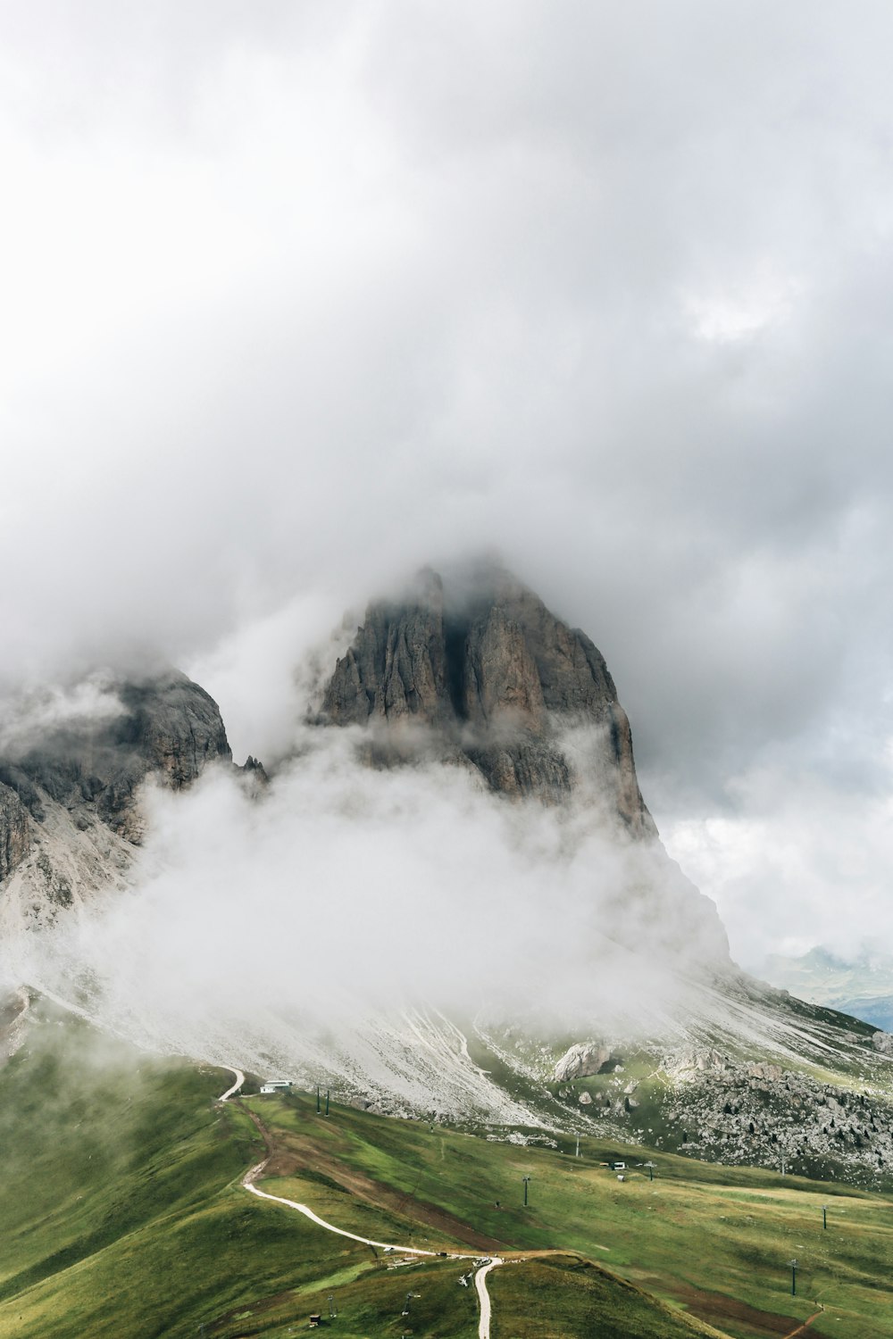 gray mountain range covered with clouds