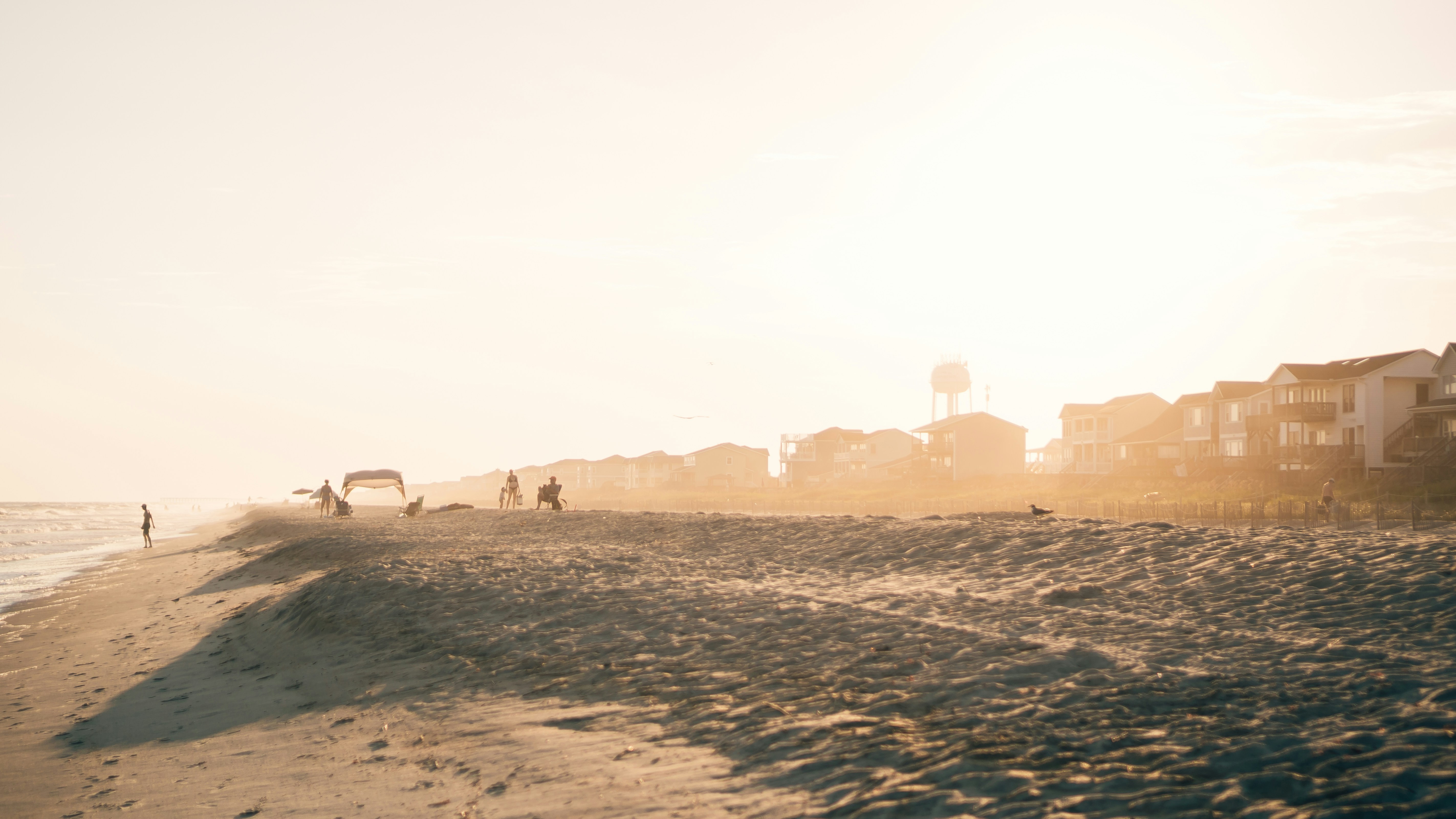 people on seashore, Sunset at Holden Beach