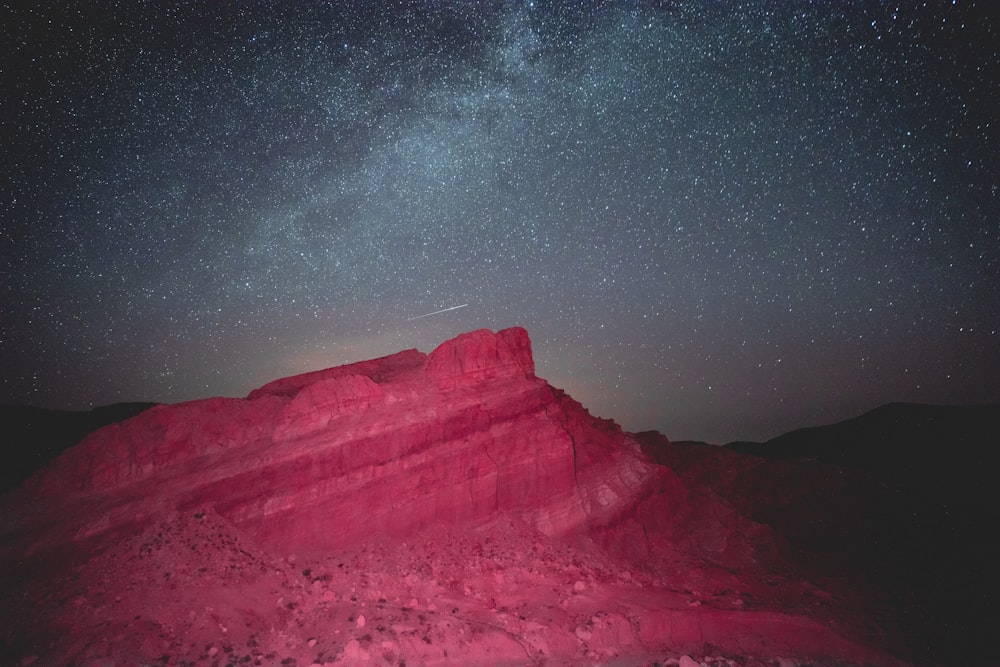 brown hill during nighttime