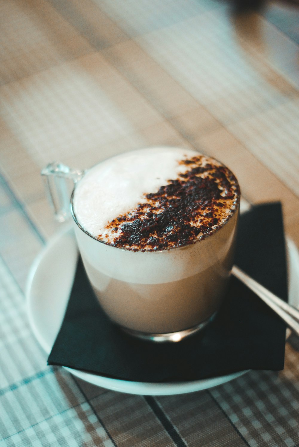 latte art in clear glass cup