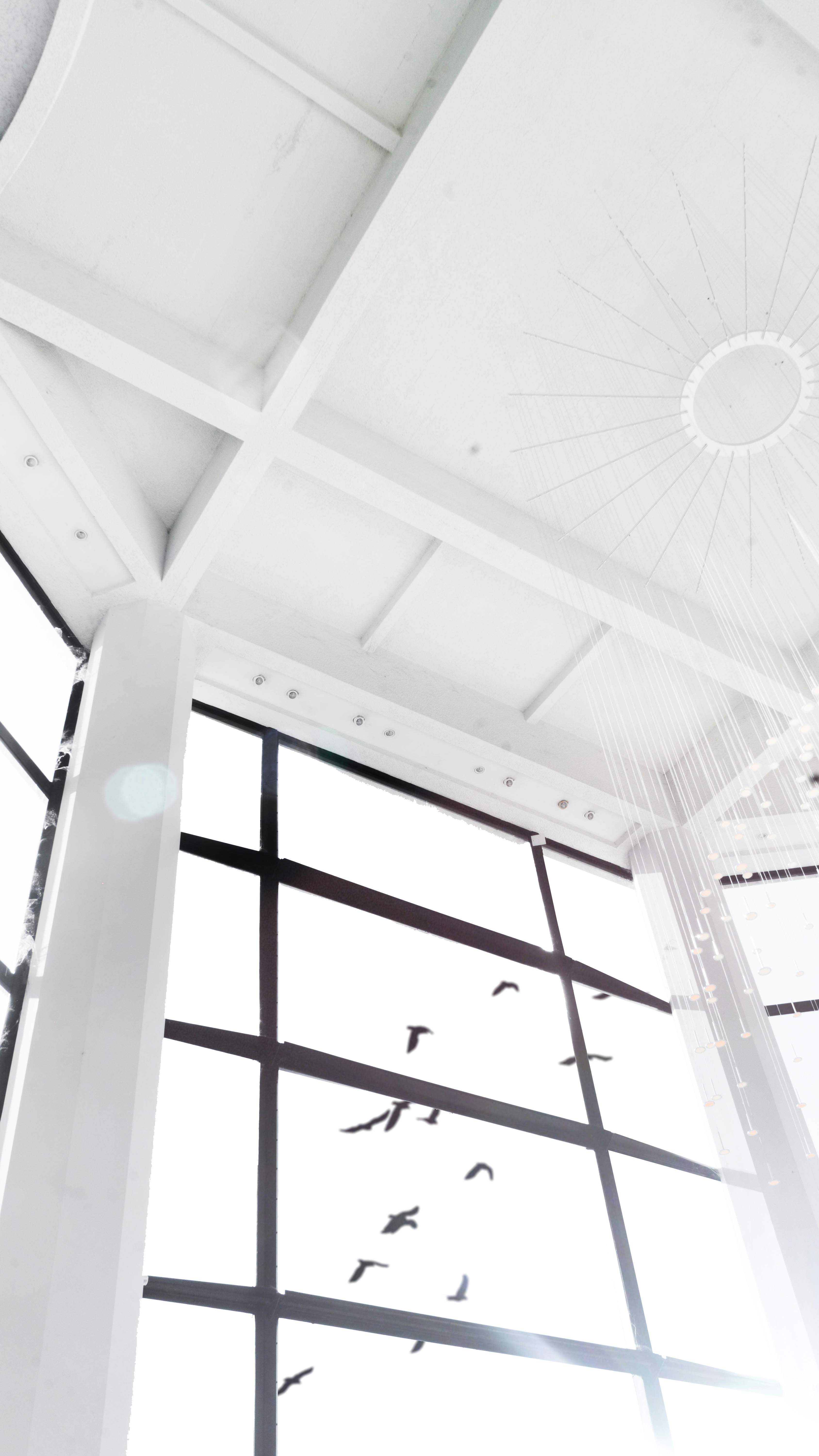 white wooden framed glass window