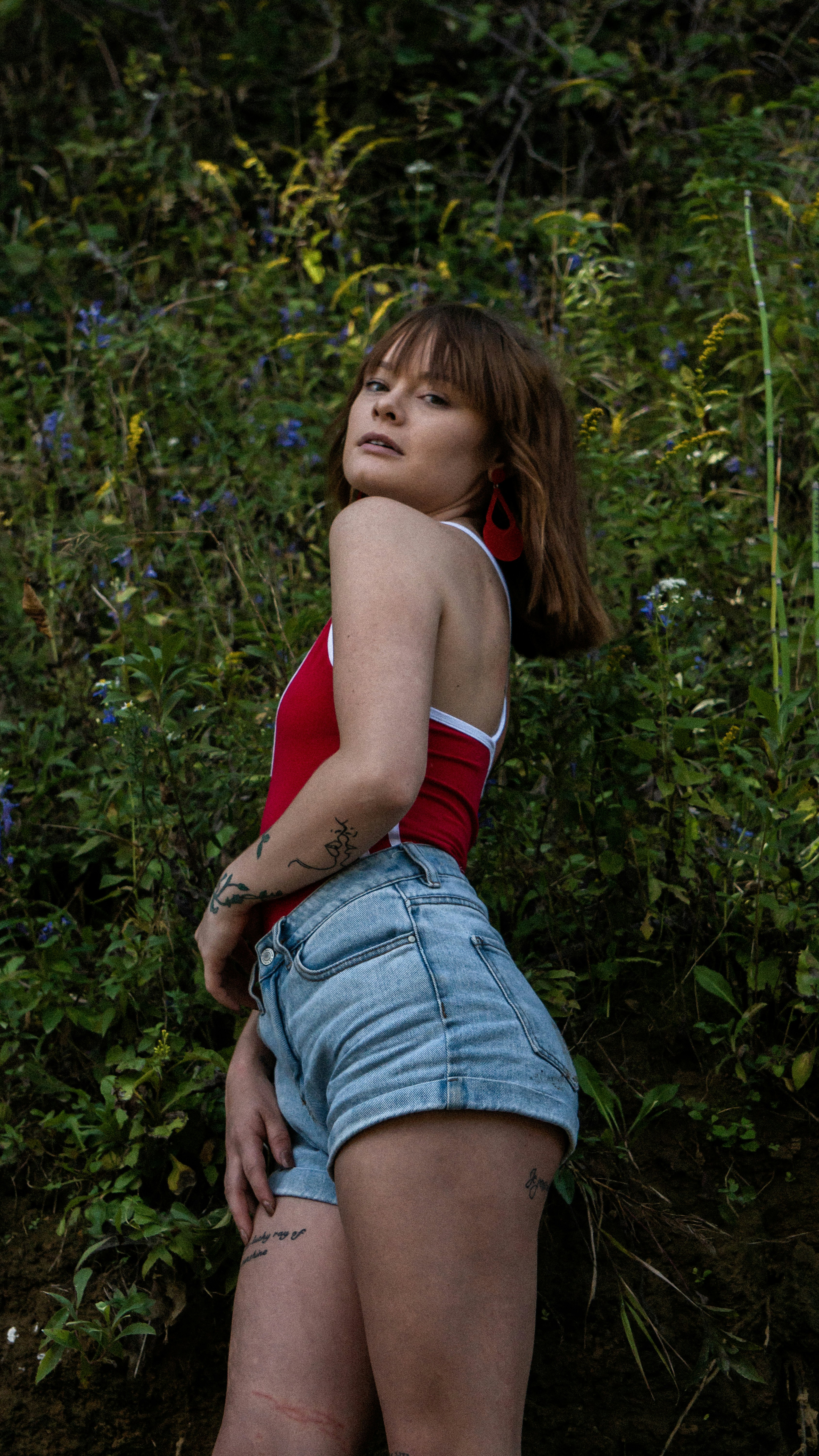 woman wearing blue denim shorts