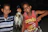 Group of happy friends holding fresh fish caught during a sea fishing trip near Costa Blanca.