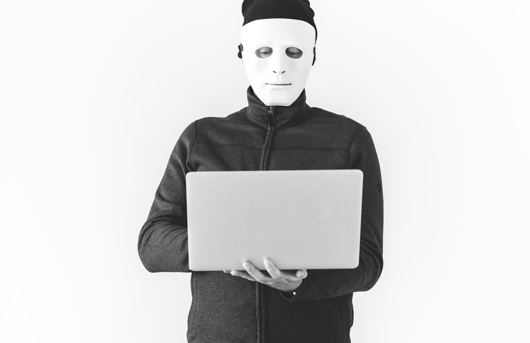 person holding laptop computer