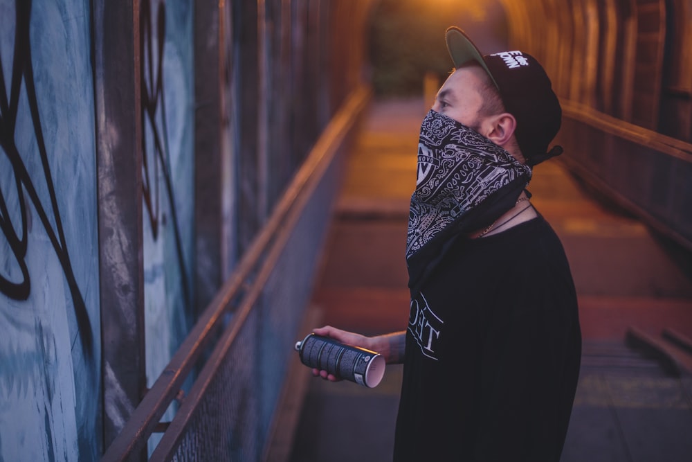 man holding spray bottle