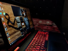 A cheerful traveler using a laptop with vibrant Mexican decorations around.