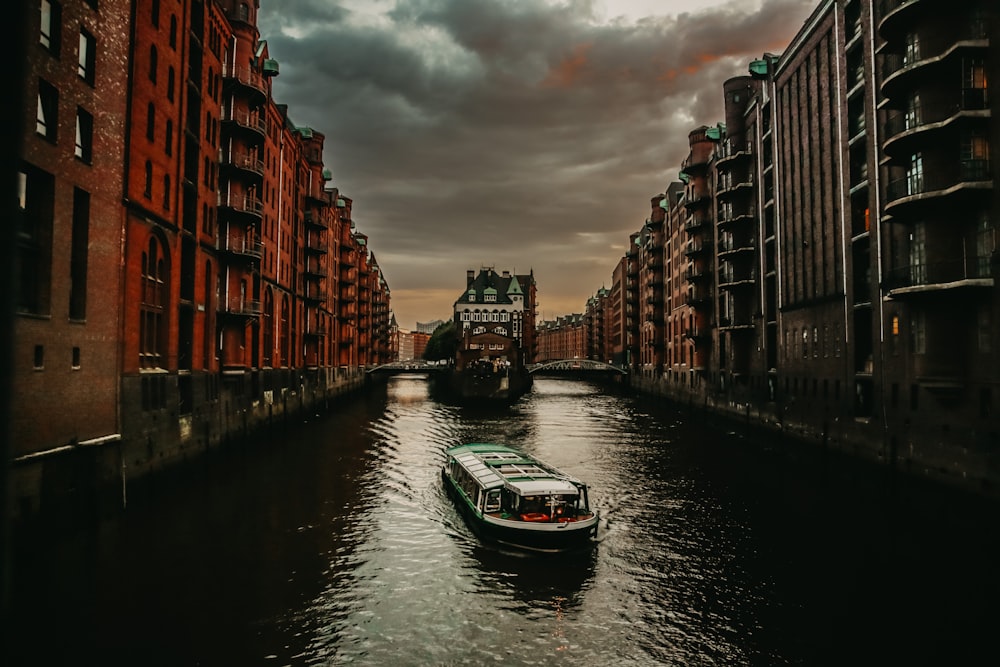 white boat on body of water