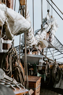Close-up of a ship's deck with ropes and equipment neatly arranged, reflecting professionalism.