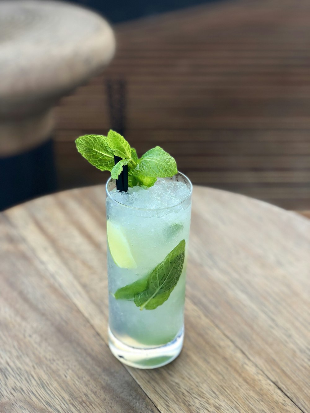 mint juice in clear drinking glass