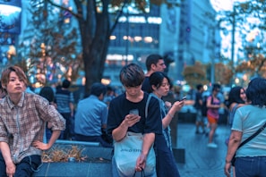 A dynamic lifestyle scene with people using smart gadgets.