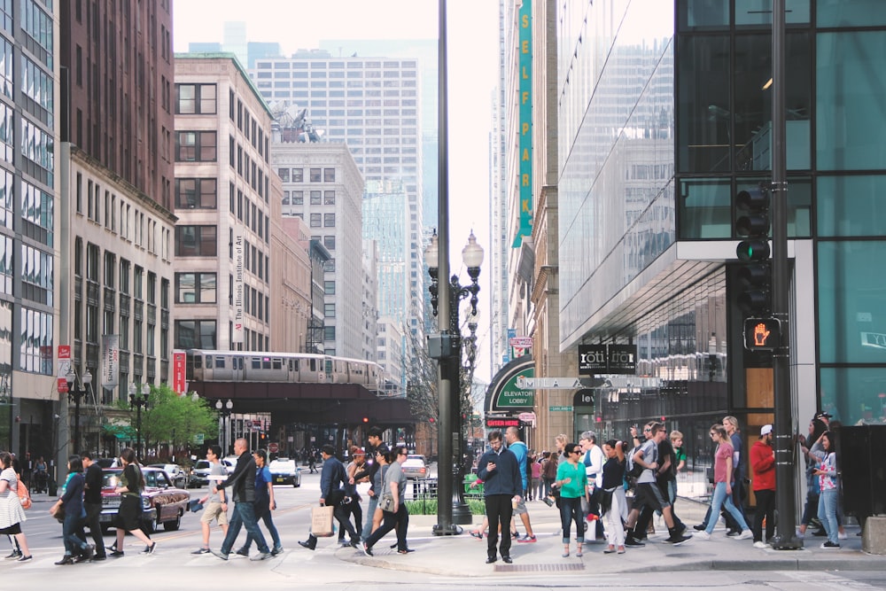 people crossing on pedestrian lane