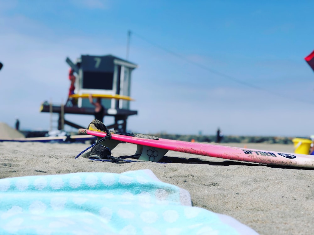 close-up photo of pink surfboard