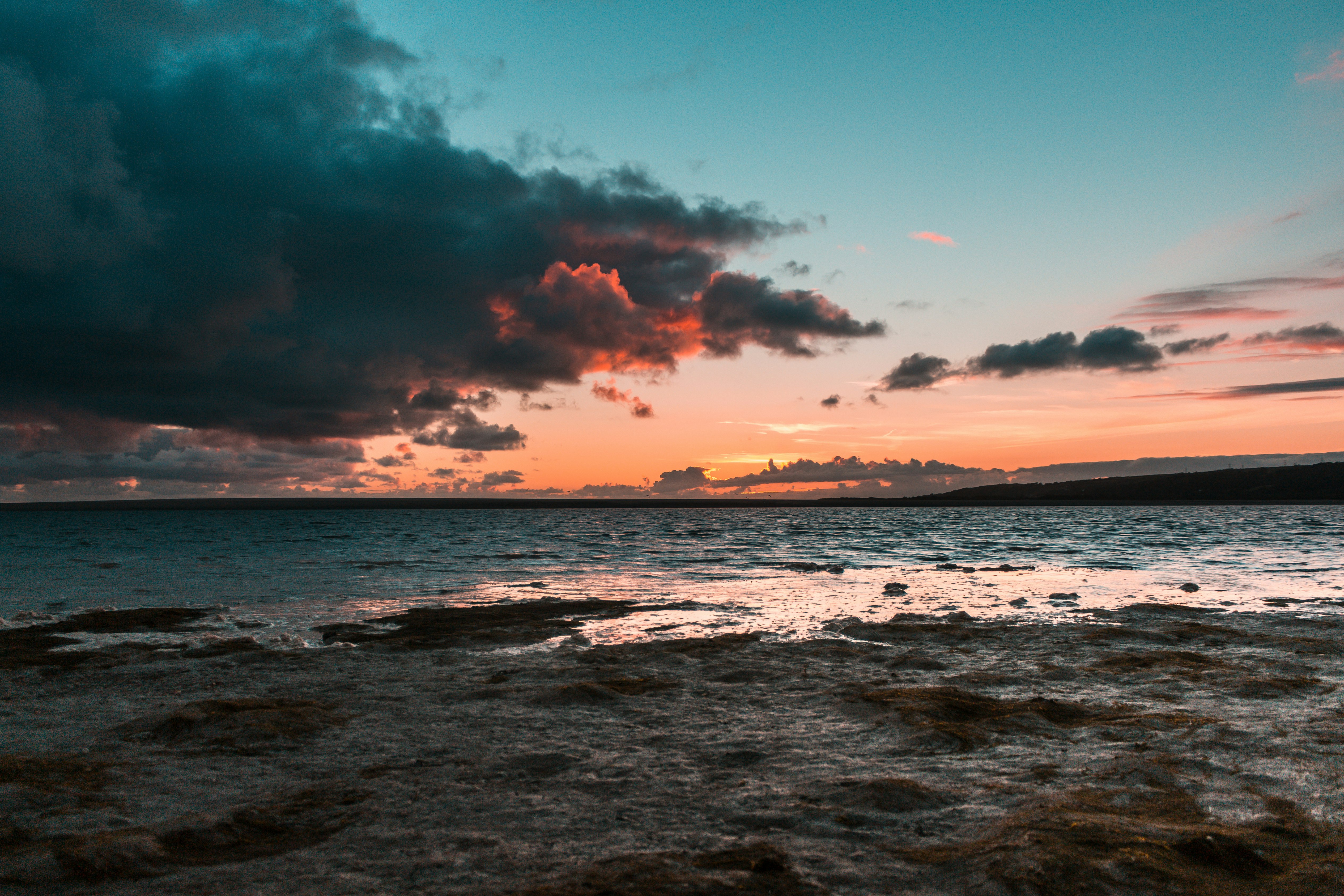 seashore under dark sky