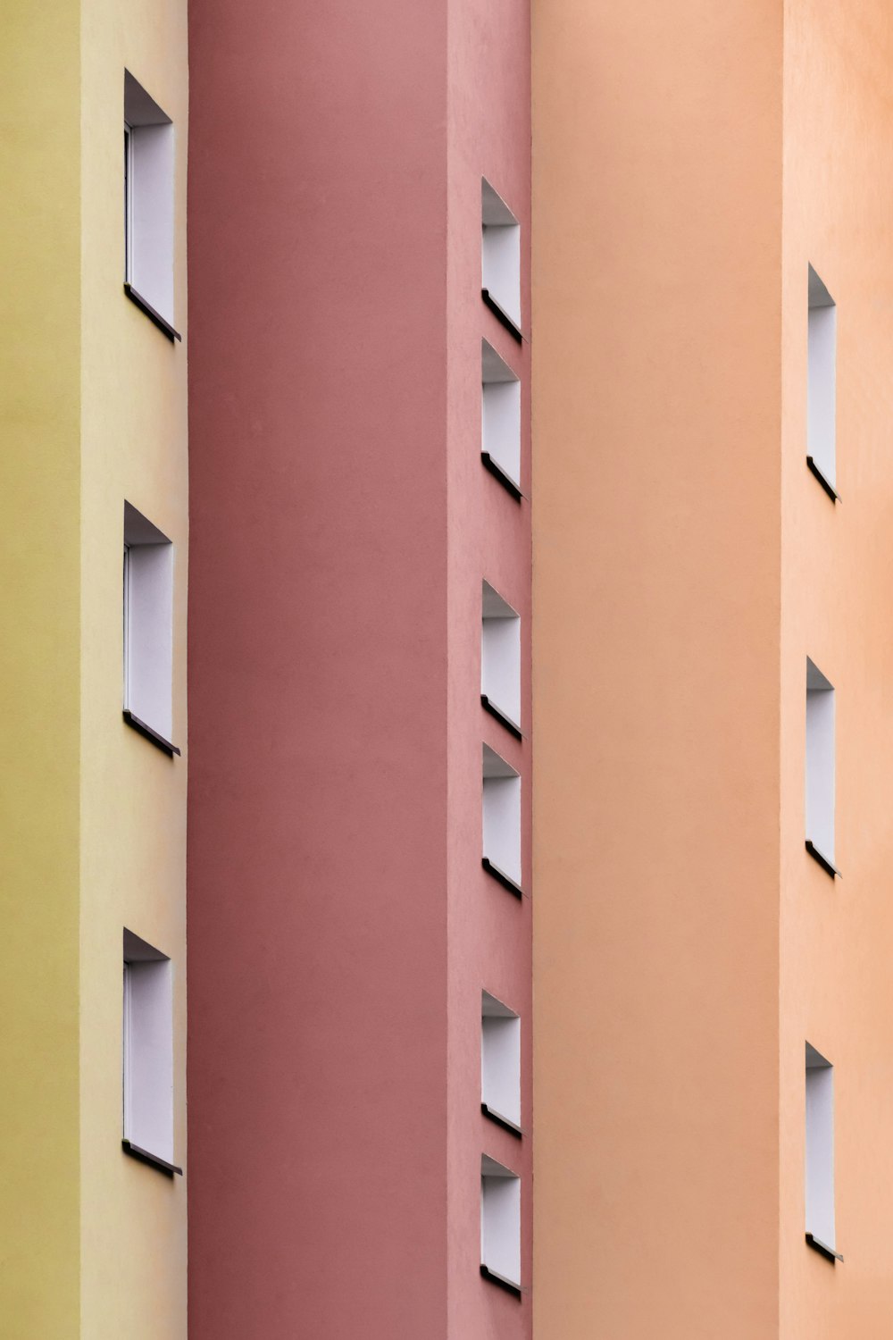 pink, yellow, and beige painted wall