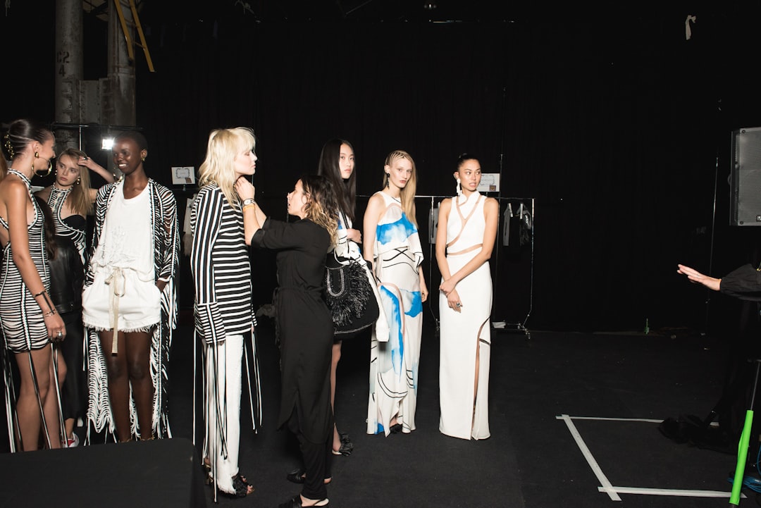 group of female standing on stage