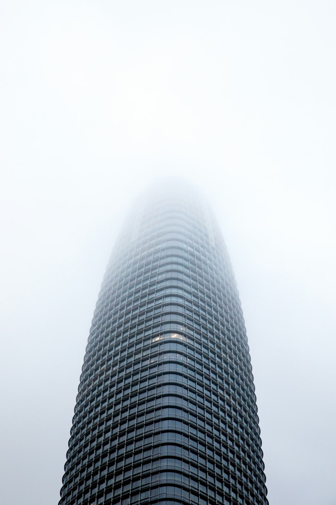 low angle photo of black high rise building