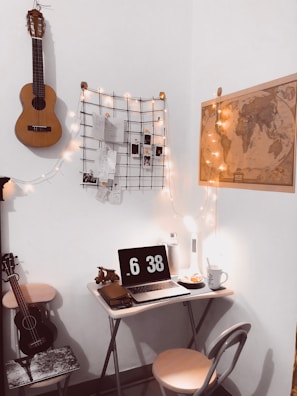 Compact workspace corner with smart storage solutions in a 2BHK flat.