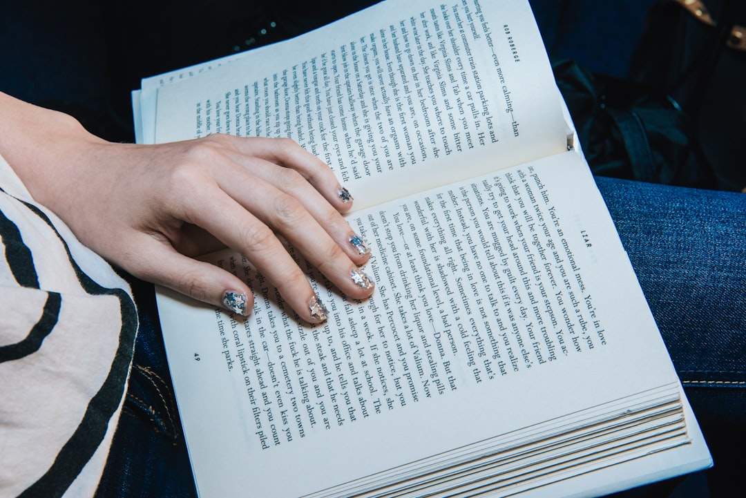 person reading on opened book