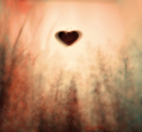 Abstract hearts and gentle energy waves blending softly on a warm beige background.