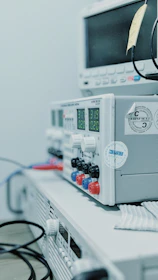 close-up photo of white and gray medical machine