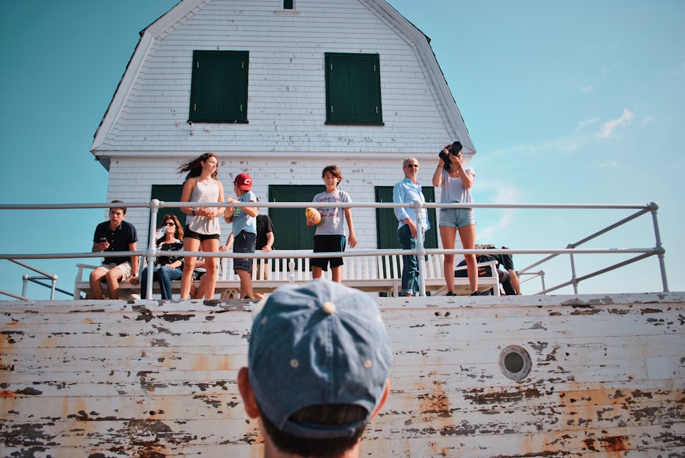 people on rooftop under blue sky