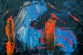 blue, black, and orange abstract painting