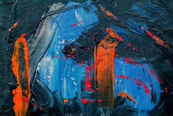 blue, black, and orange abstract painting