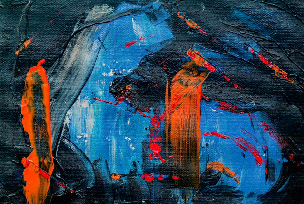 pintura abstracta azul, negra y naranja