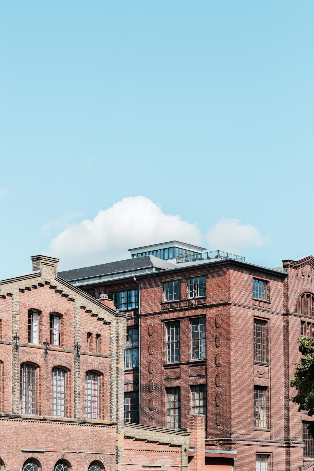 brown stone brick building under cloudy sky