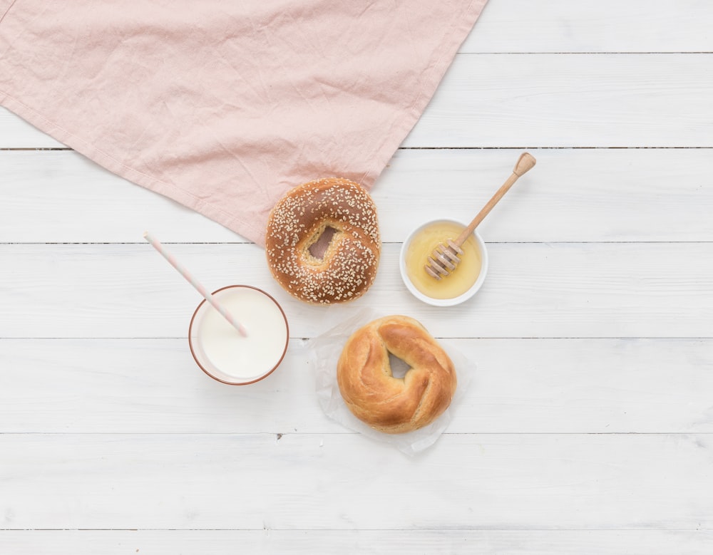 two doughnuts on top of mats