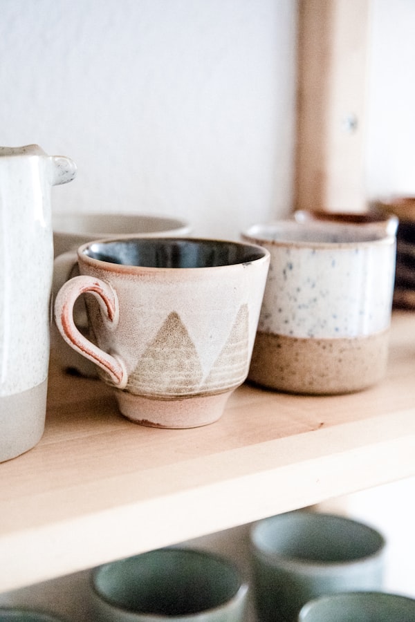 Two mugs on a scrubbed table