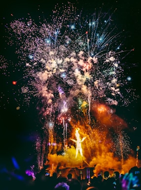 crowd of people watching fireworks display